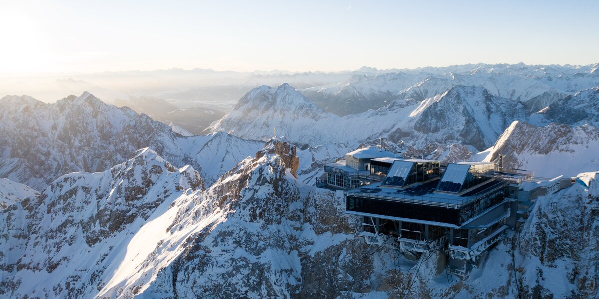 Modern mountain station on a snow-covered peak in the Alps.